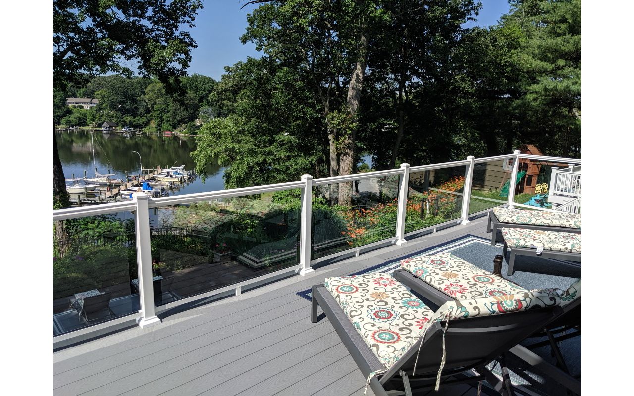 Trex Select Pebble Gray Composite Decking with White Aluminum Railing with Full Glass Panel Infills in Severna Park MD