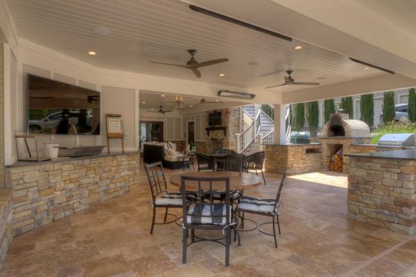 Trex Deck with Rain Escapes, Outdoor Kitchen & Bar, Fireplace, Travertine Patio