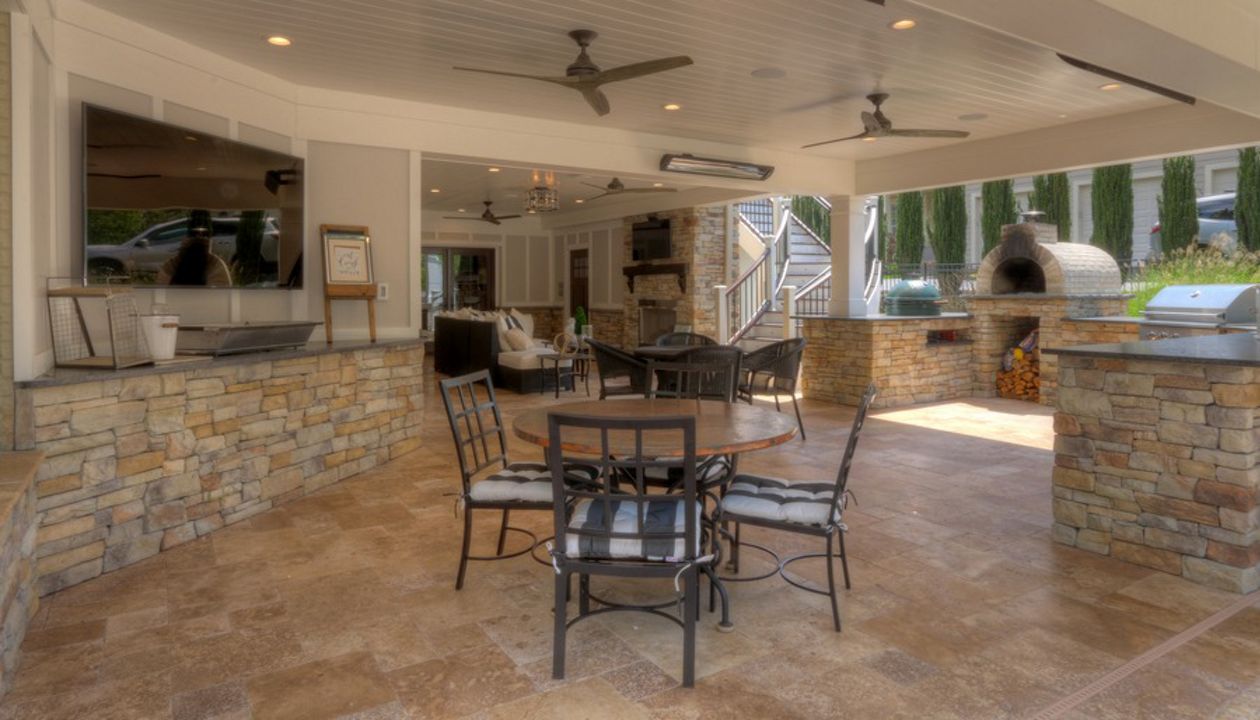 Trex Deck with Rain Escapes, Outdoor Kitchen & Bar, Fireplace, Travertine Patio