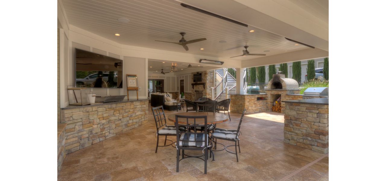 Trex Deck with Rain Escapes, Outdoor Kitchen & Bar, Fireplace, Travertine Patio