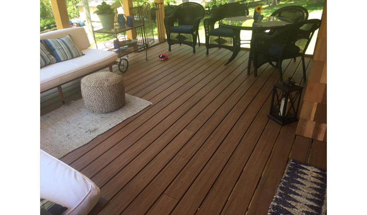 Covered Trex porch is a great place to relax and enjoy the shade