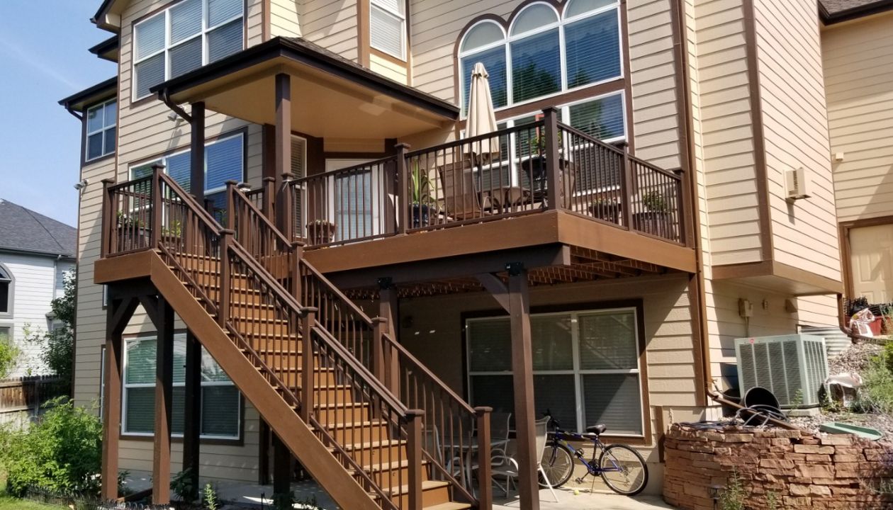 Trex Select decking, bronze rails, lights, porch roof