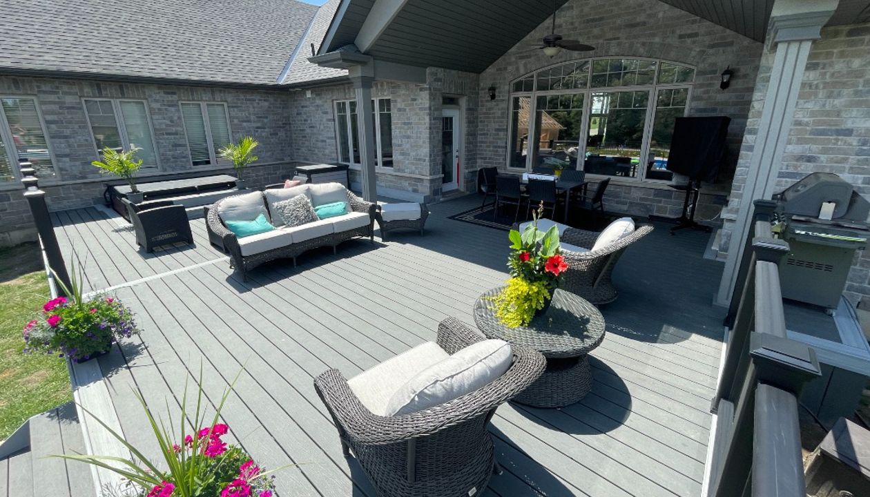 Main: Trex Enhance Basics in Clam Shell. Trim: Trex Enhance Naturals in Foggy Wharf. Contact Align Decking today for your custom composite decking needs. Servicing Toronto, Durham Region, Kawartha Lakes, and the Barrie & Orillia areas.