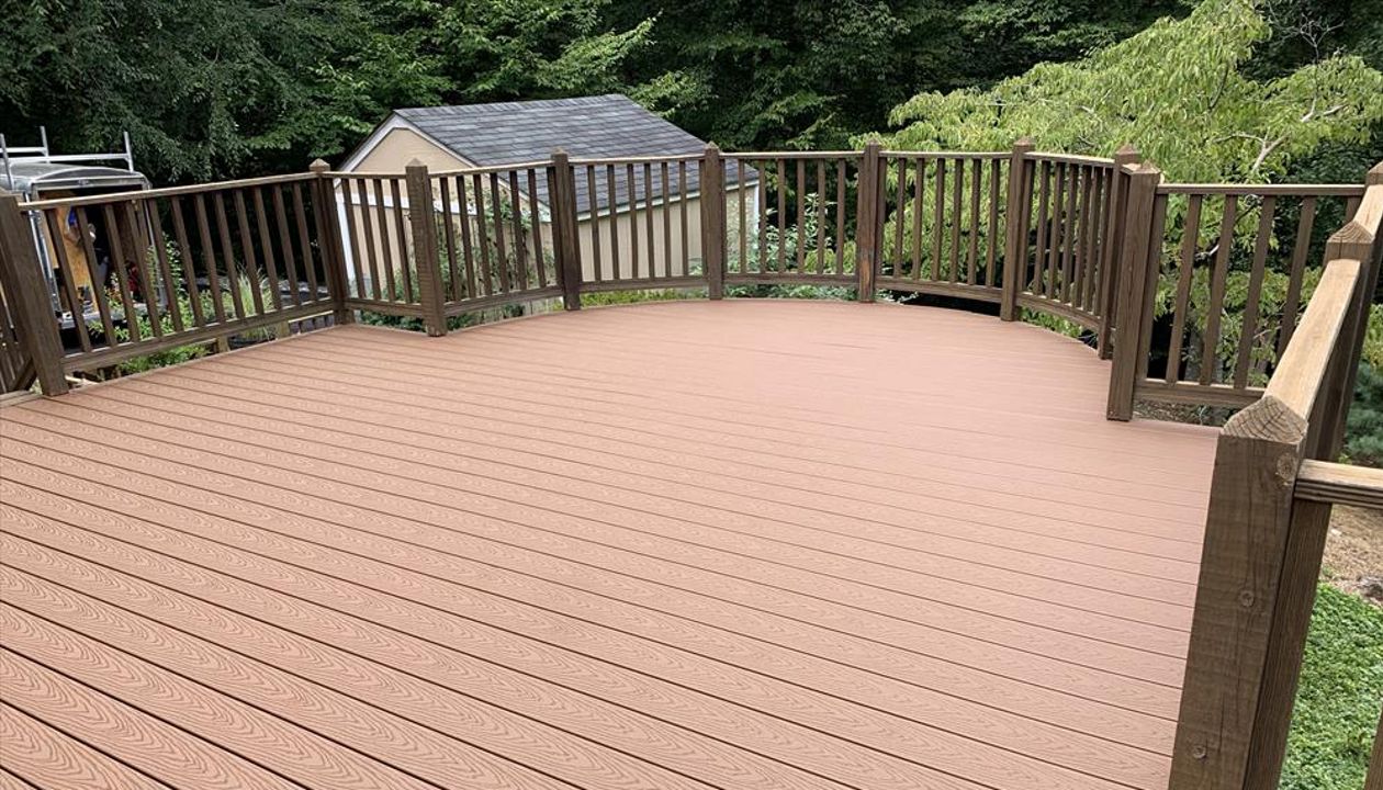Fun curved deck done in Saddle.
