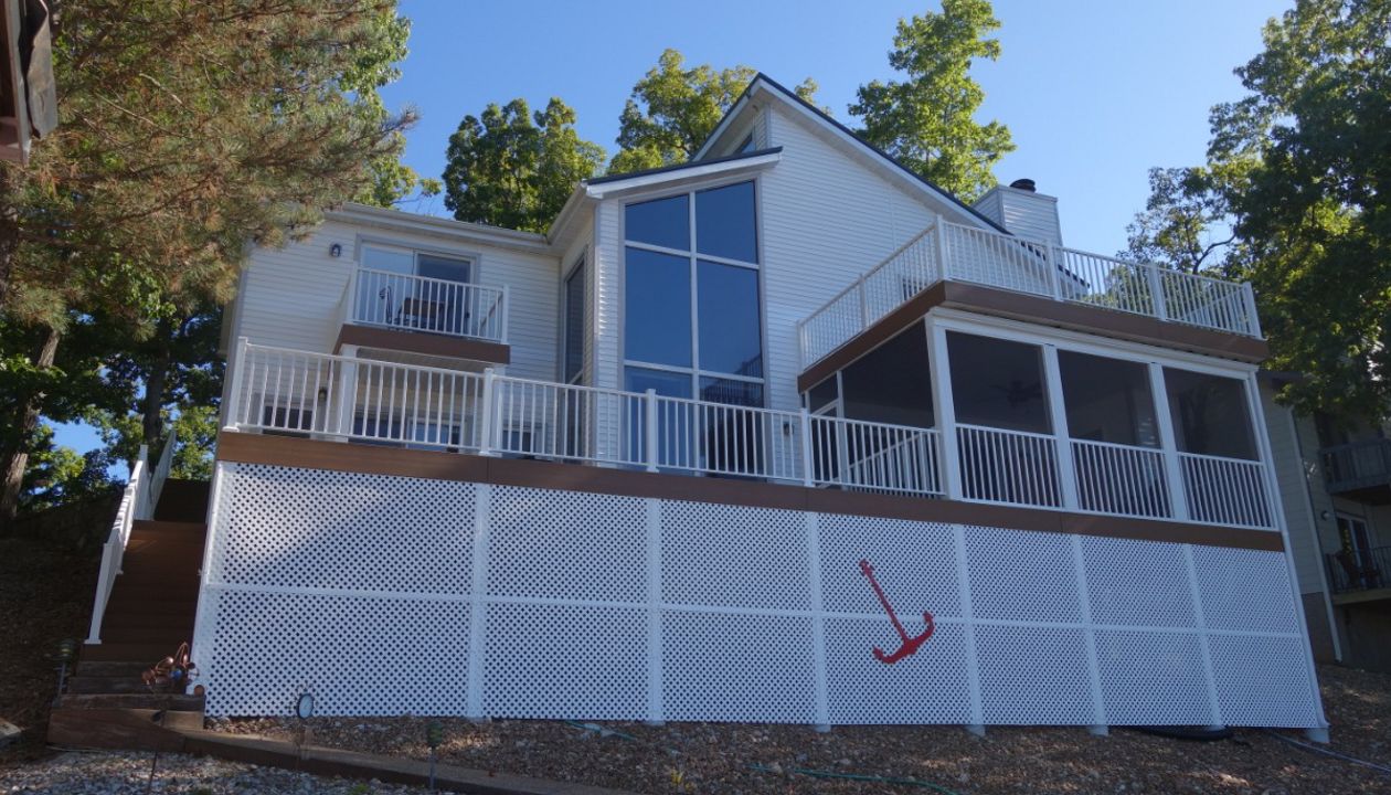 Statement Piece for the Lake Front done with Select Saddle with aluminum railing done in Lake Ozark, Mo