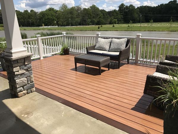 Enjoying a view from this Tiki Torch deck with Trex Select Railing