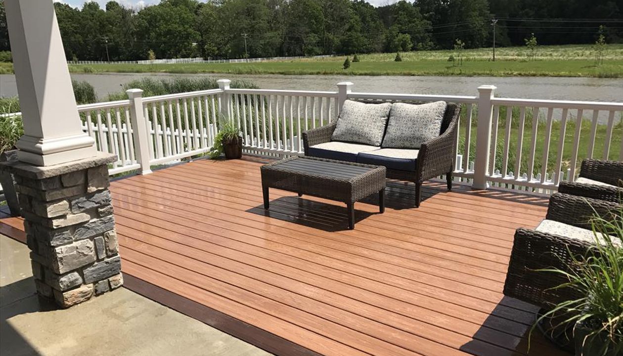 Enjoying a view from this Tiki Torch deck with Trex Select Railing