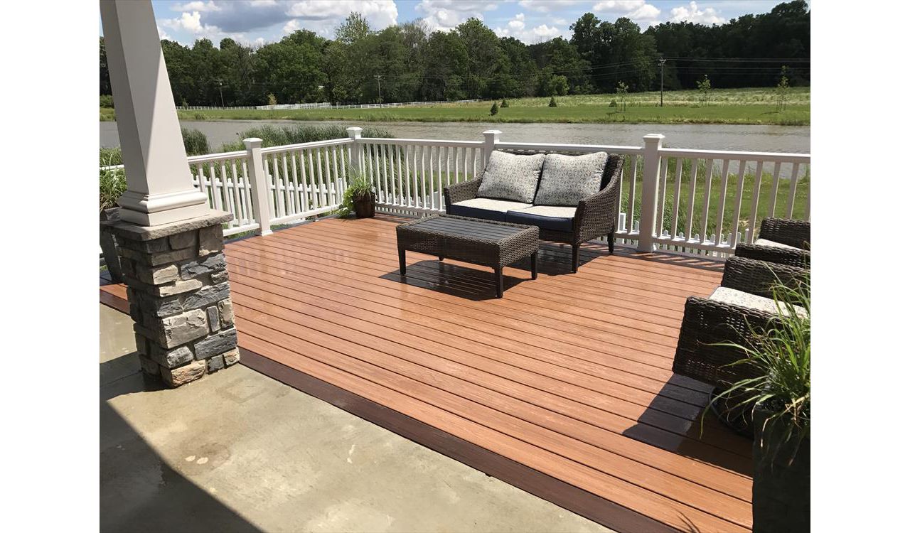 Enjoying a view from this Tiki Torch deck with Trex Select Railing