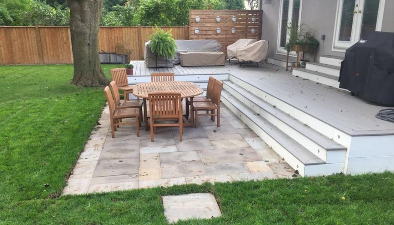Trex Transcend GRAVEL PATH stone landscape  custom made COMPOSITE deck with Trex railing and skirting. The deck built in Toronto, Mississauga, Scarborough, Etobicoke, North York, Markham, Richmond Hill, Thornhill, Vaughan