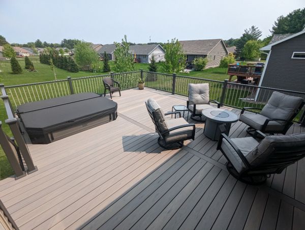 Trex composite lineage decking, Biscayne in color, aluminum railing.