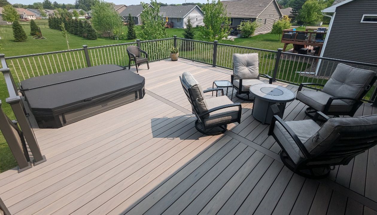 Trex composite lineage decking, Biscayne in color, aluminum railing.