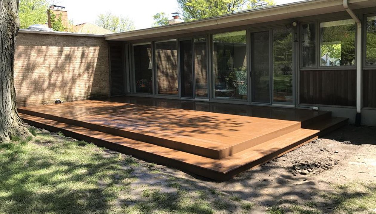 New Deck in Flossmoor IL. Low to the ground with a wrap around step to grade.