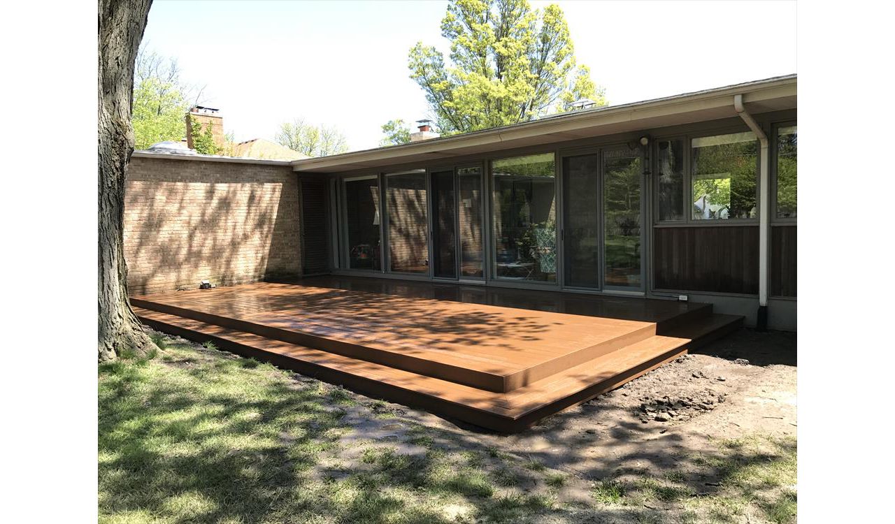 New Deck in Flossmoor IL. Low to the ground with a wrap around step to grade.