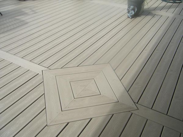 Transcend Rope swing decking with custom inlay, Brownstown Twp.