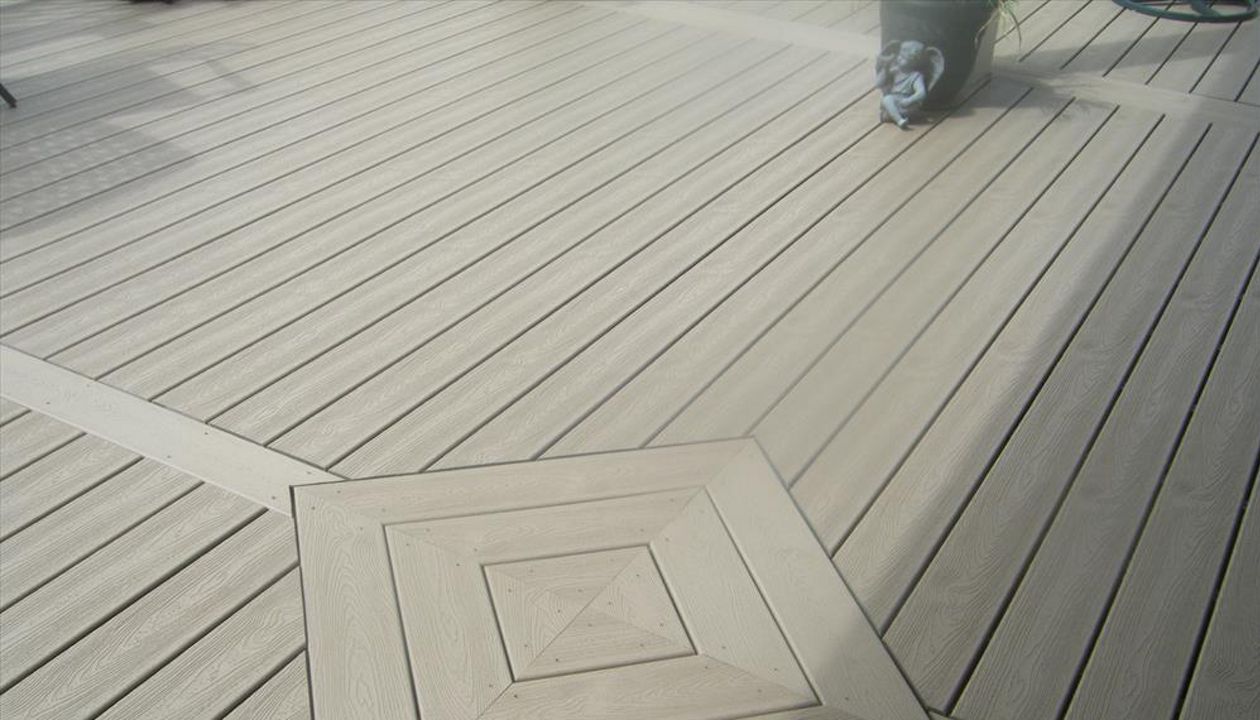 Transcend Rope swing decking with custom inlay, Brownstown Twp.