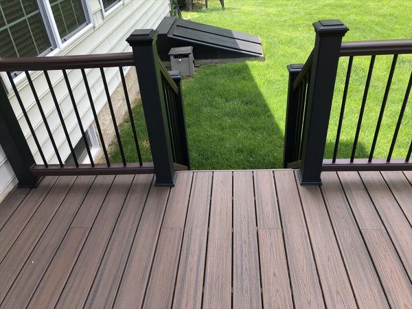 Tiki Torch Decking with Black Transcend Railings