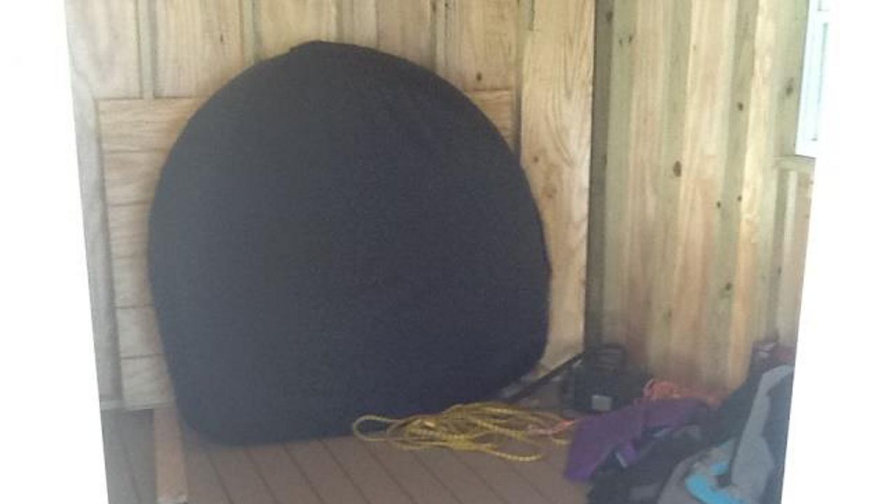 Great storage space behind bar with Rope Swing Trex Decking