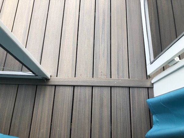 Custom Trex Enhance Rocky Harbor transition piece for this wonderful project