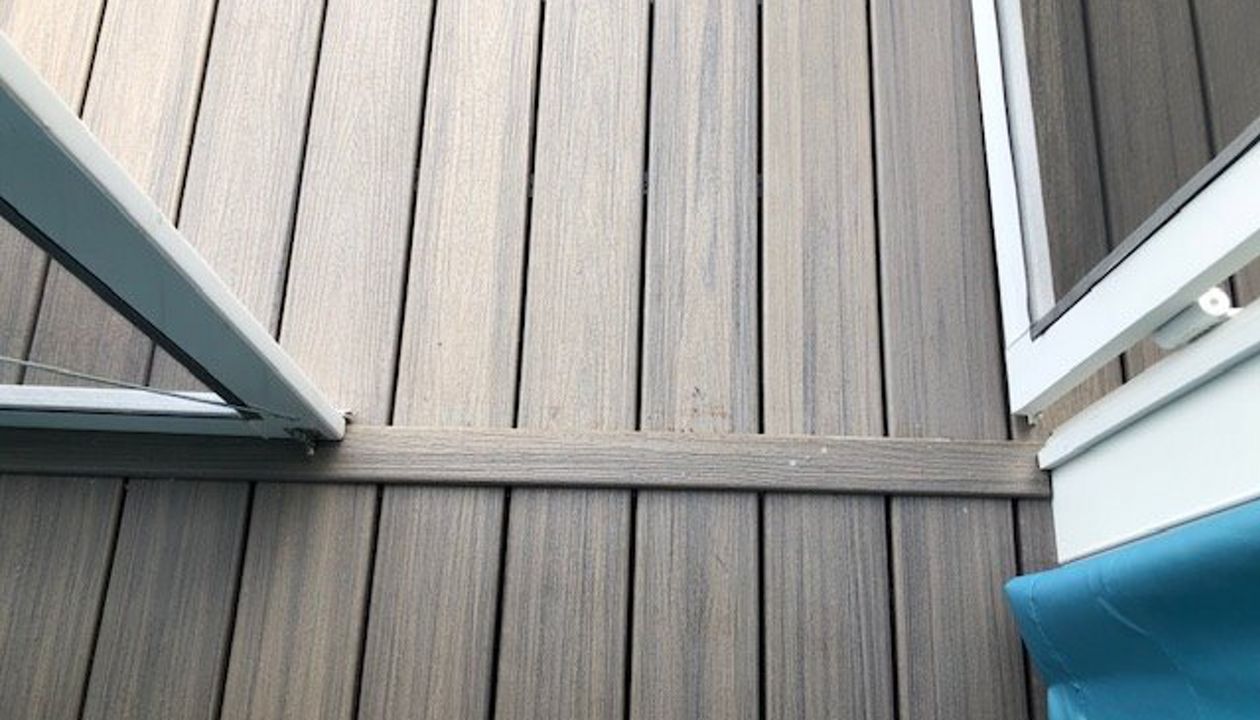 Custom Trex Enhance Rocky Harbor transition piece for this wonderful project