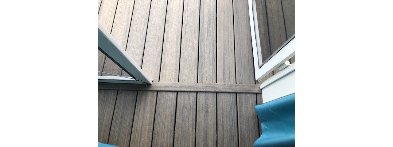 Custom Trex Enhance Rocky Harbor transition piece for this wonderful project