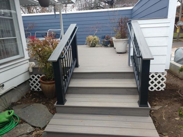 Trex Rocky Harbor decking with Transcend stair railings, and Trex ADA hand rails