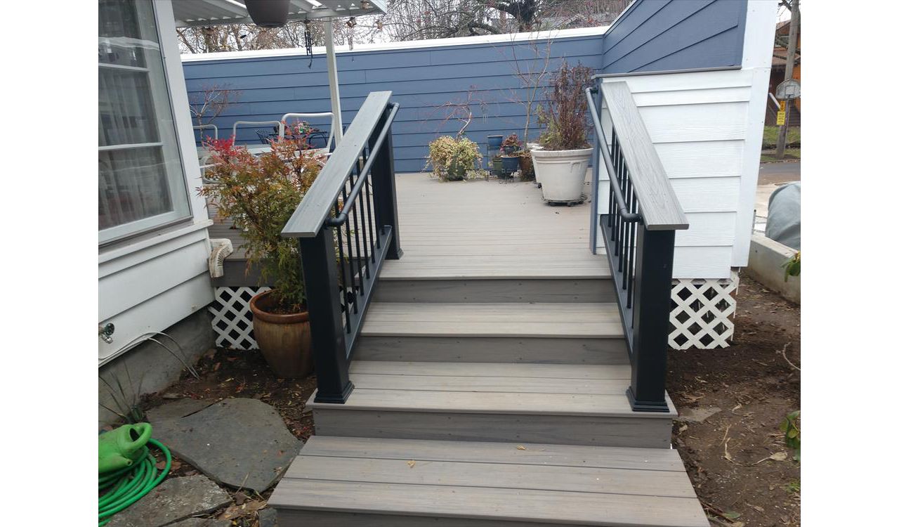 Trex Rocky Harbor decking with Transcend stair railings, and Trex ADA hand rails