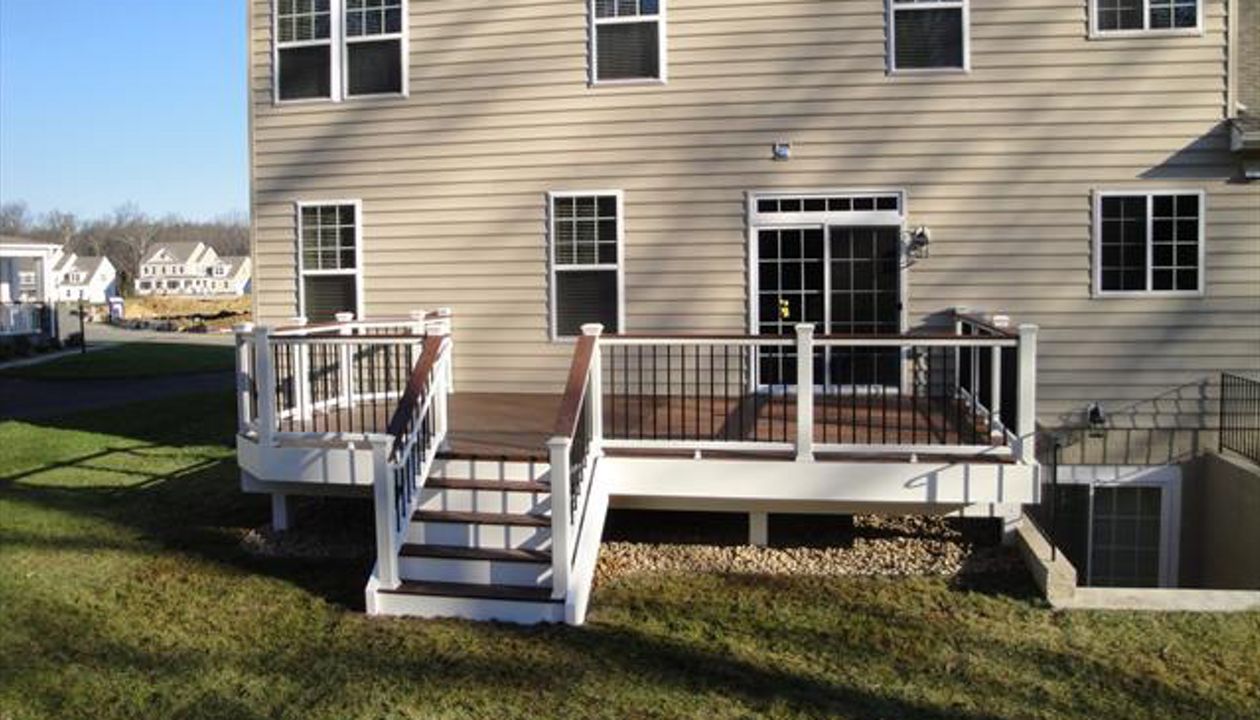 trex fire pit flooring with white transcend railing