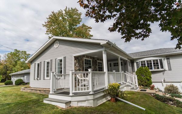 Front porch with custom front walk out.