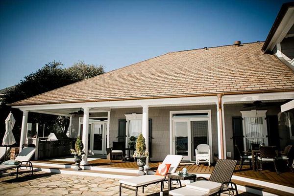 This covered deck area is the perfect place to entertain friends & family.