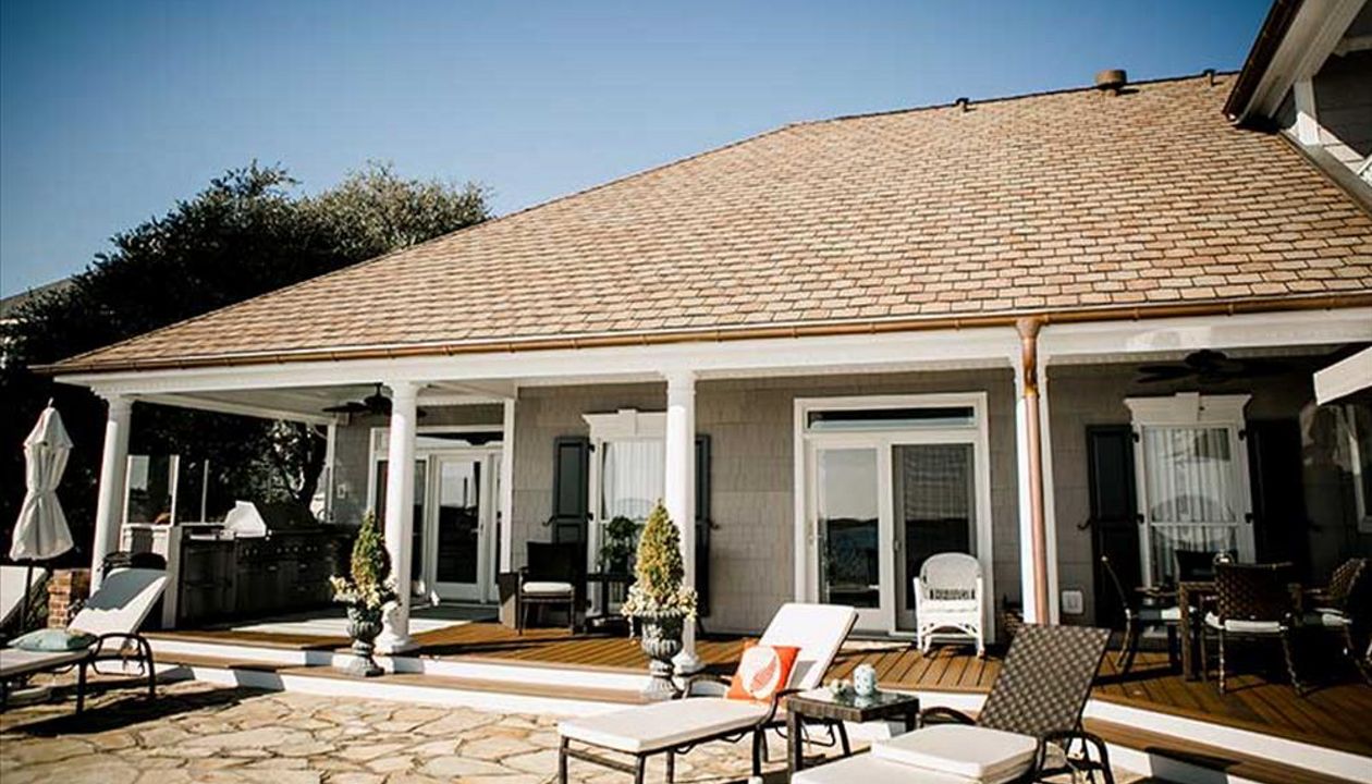 This covered deck area is the perfect place to entertain friends & family.