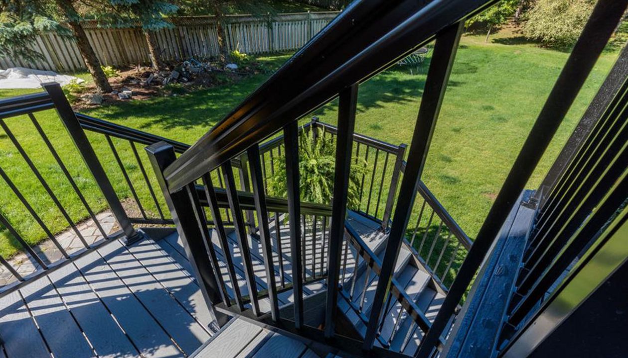 Grey Composite Decking using Select Pebble Grey with Winchester Grey trim - Orangeville, Caledon, Alliston, Bolton