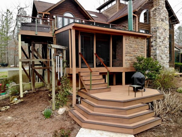 Transcend Tiki Torch decking with Lava Rock border.