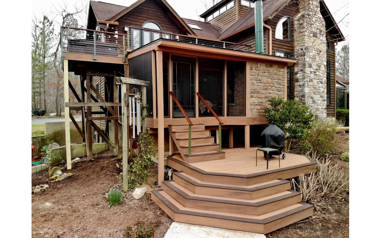 Transcend Tiki Torch decking with Lava Rock border.