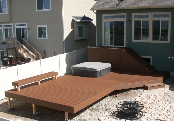 24x12 Trex saddle lower platform, skirted storage and built around hot tub with trex bench