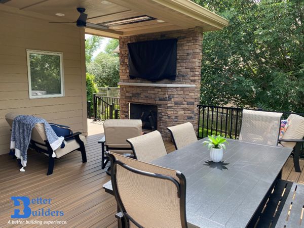 New covered deck with Transcend decking, Signature railing, and Trex Lighting - Better Builders of Iowa - Project in Urbandale