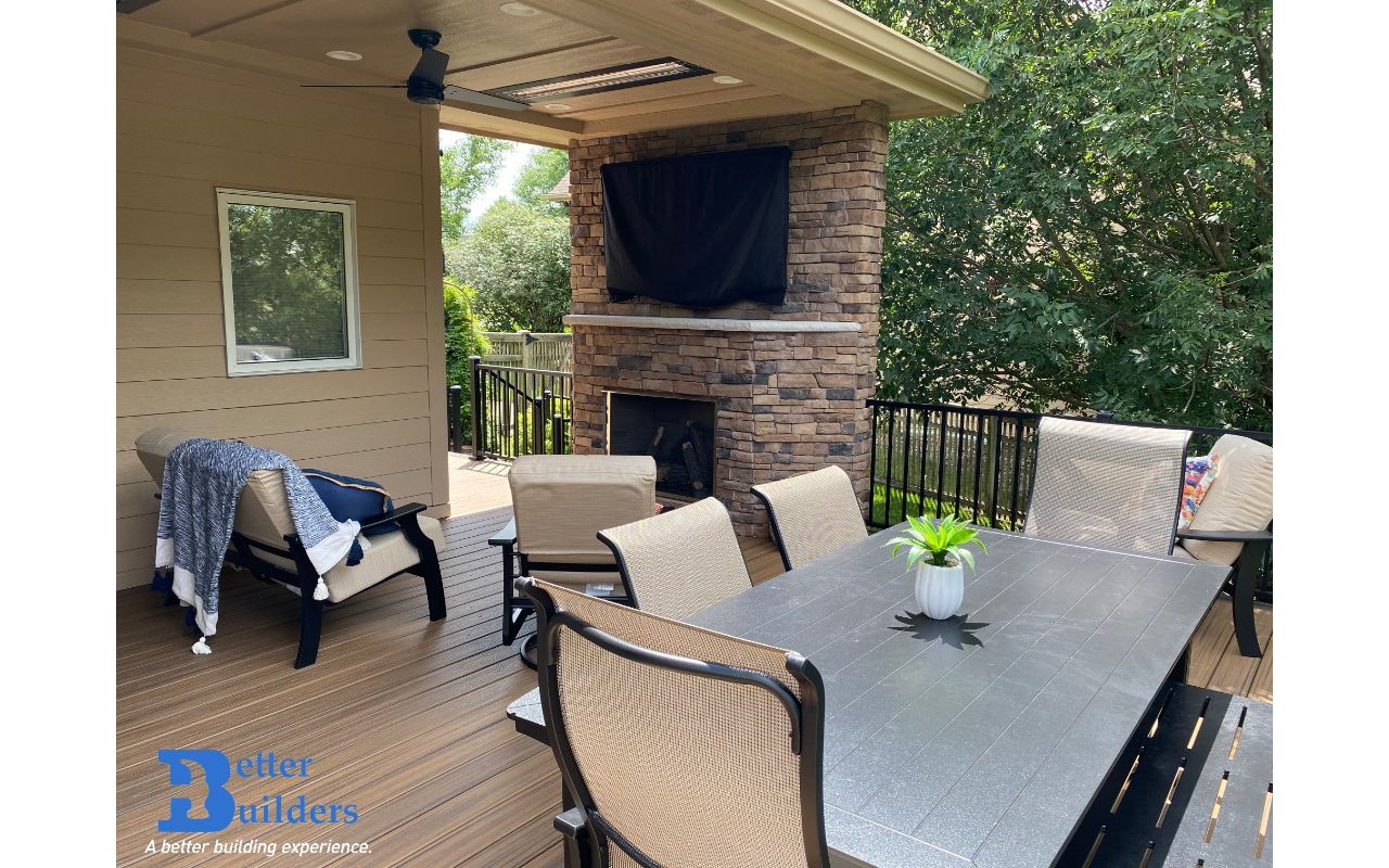 New covered deck with Transcend decking, Signature railing, and Trex Lighting - Better Builders of Iowa - Project in Urbandale