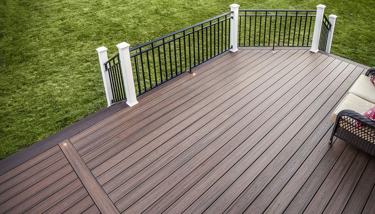 Combining beauty and durability, this Spiced Rum Trex Transcend decking in Kingwood, N.J.,  looks particularly sharp when paired with Vintage Lantern border and fascia.