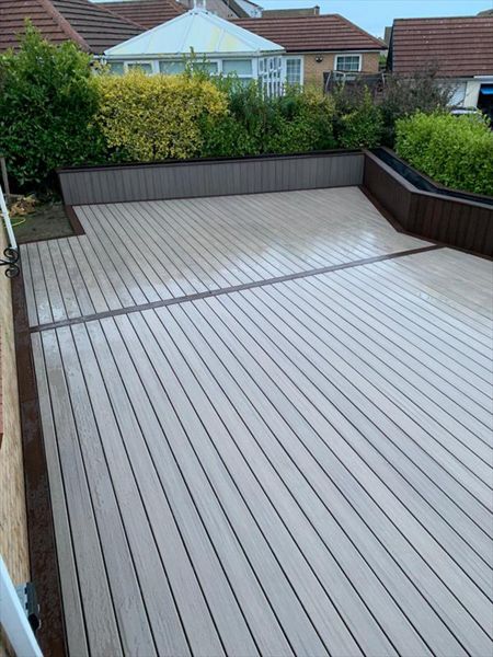 Something a little different, rocky harbour with lava rock borders and planters around deck done at Moresby in Whitehaven.