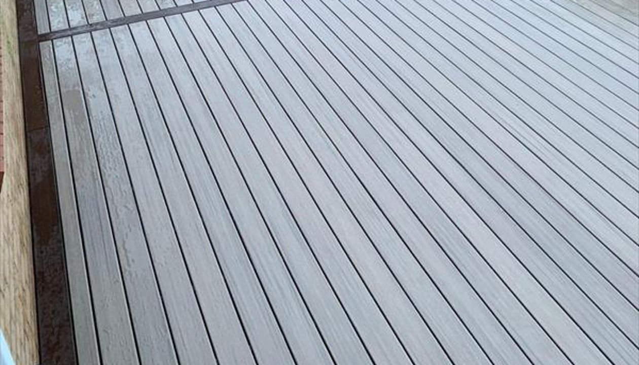 Something a little different, rocky harbour with lava rock borders and planters around deck done at Moresby in Whitehaven.