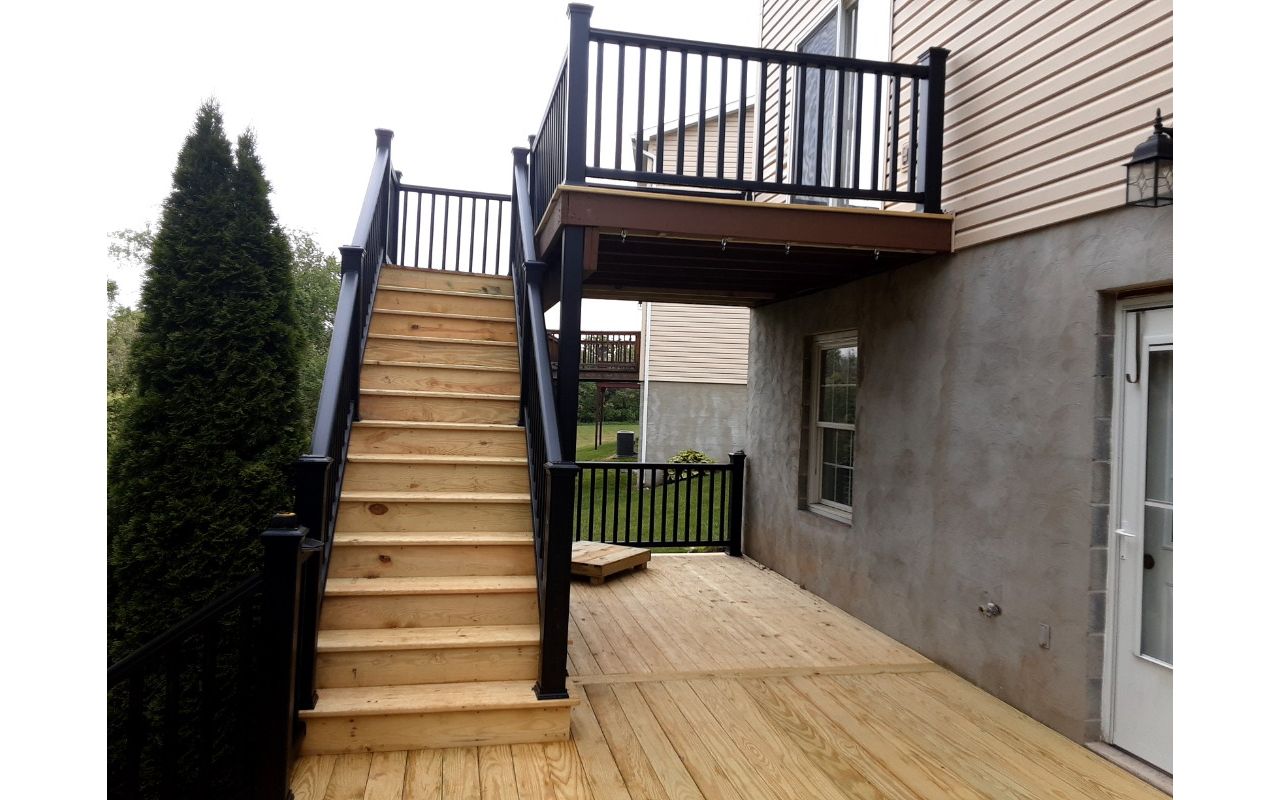 Pressure Treated Deck with Trex Transcend Black Railing near State College, PA