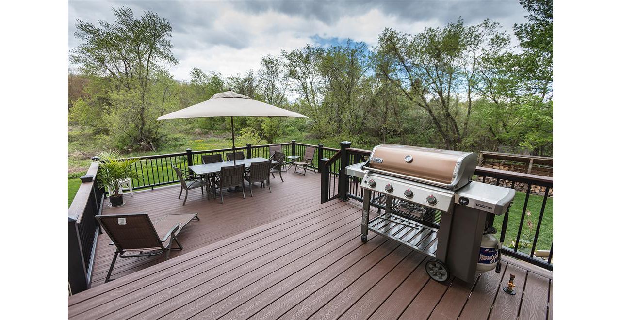 Trex LR-1 Black Aluminum Railing with Transcend deck boards in color Fire Pit