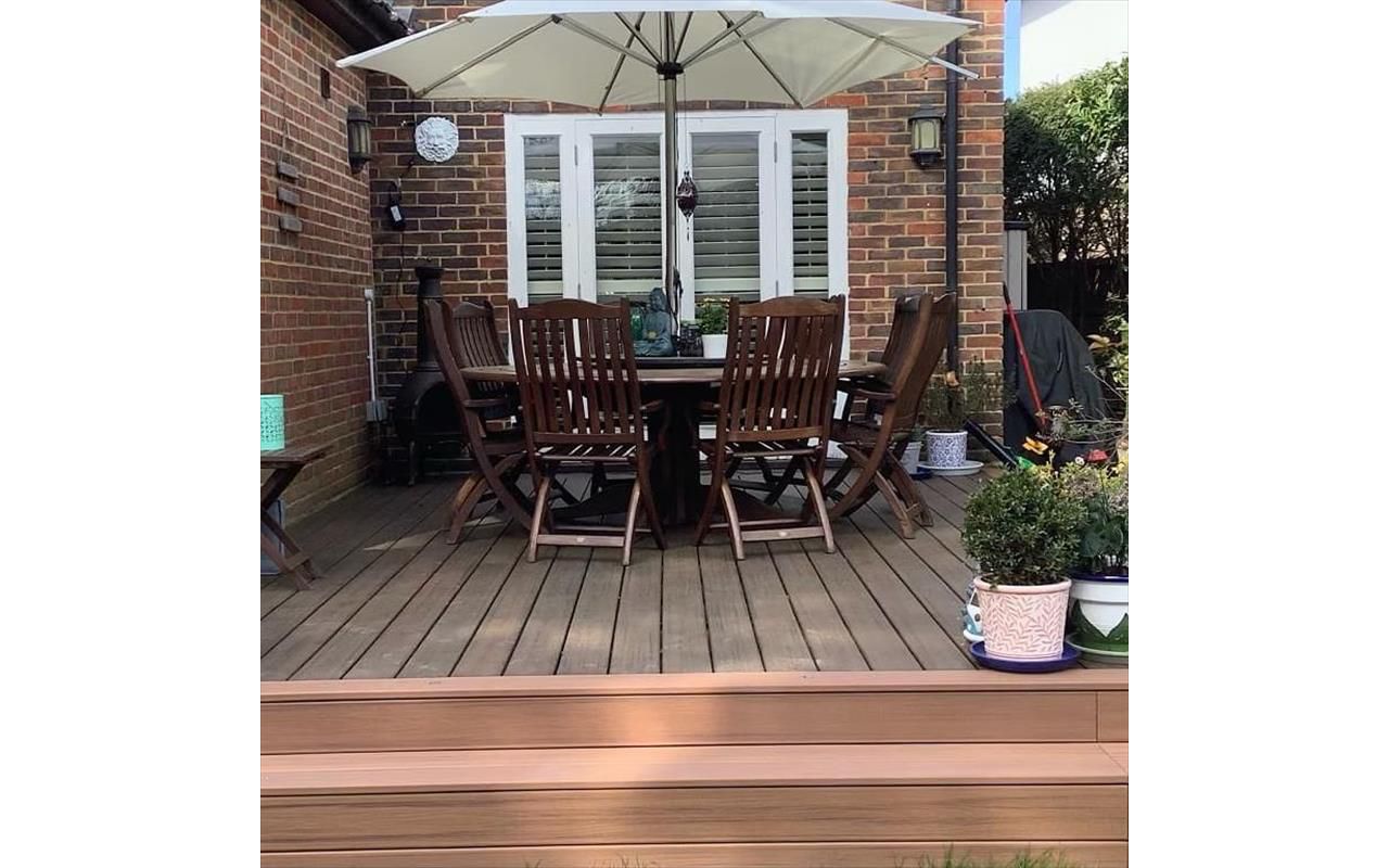 Trex Transcend Tiki Torch and Trex Transcend Spiced Rum Decking in Walton on Thames , England UK