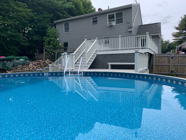 Pebble grey pool multi level pool deck