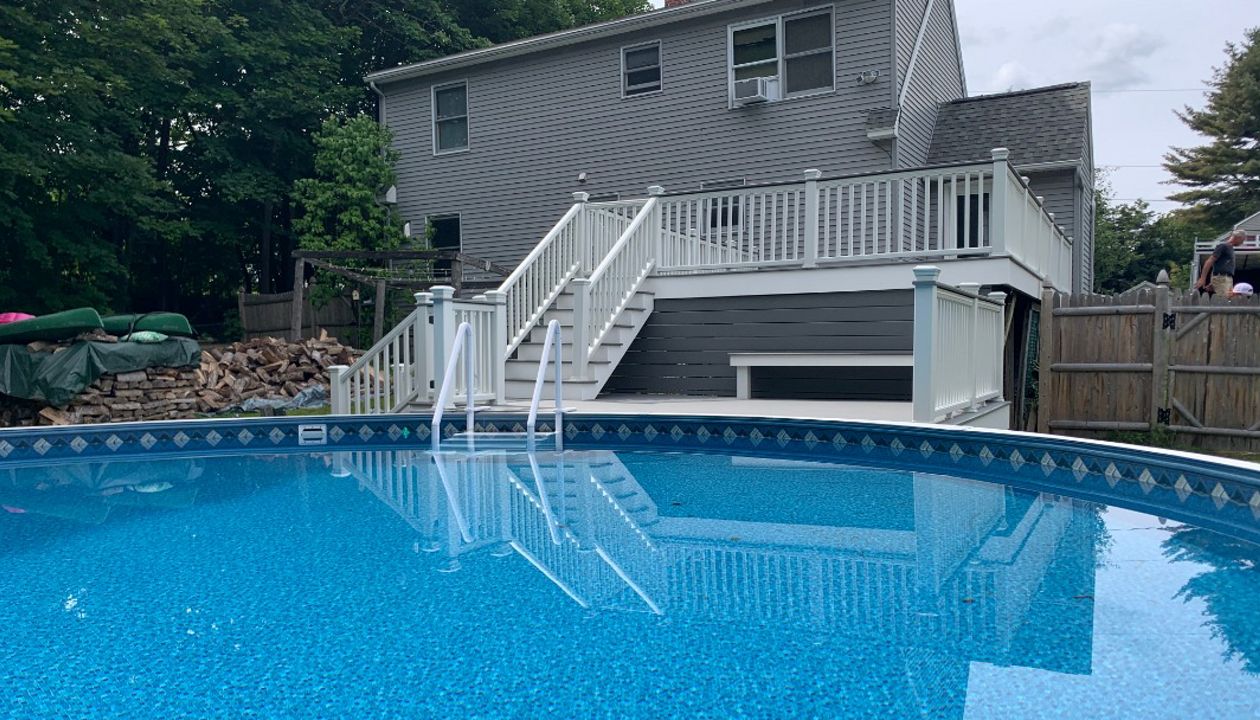Pebble grey pool multi level pool deck