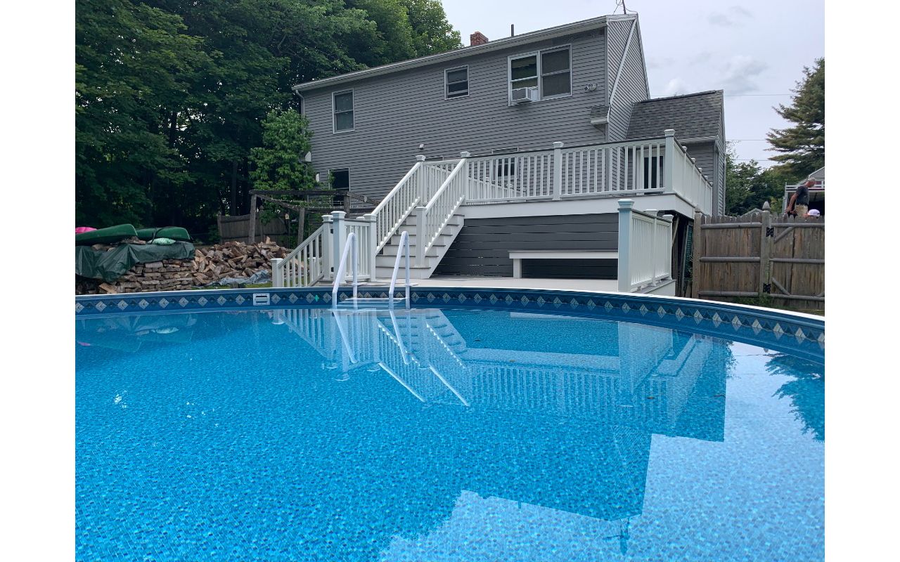 Pebble grey pool multi level pool deck