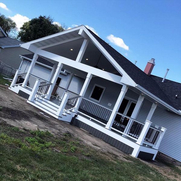 550 sf custom open air porch addition with Versatex trim and Trex clamshell decking