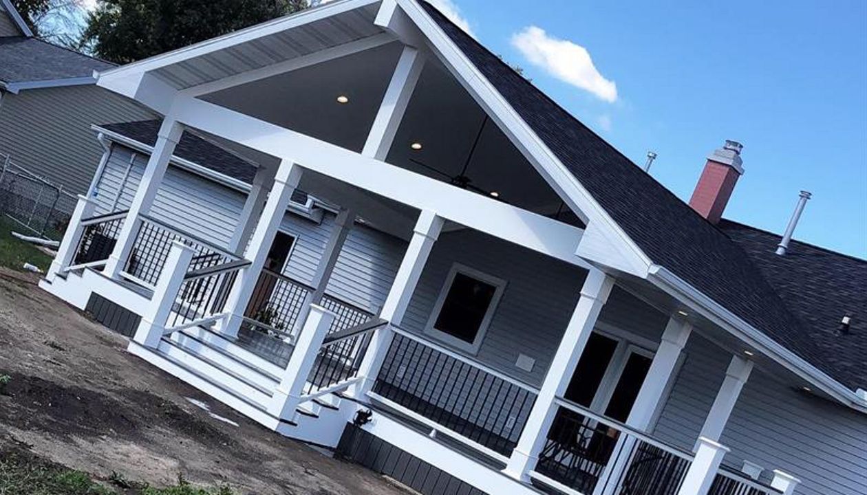 550 sf custom open air porch addition with Versatex trim and Trex clamshell decking