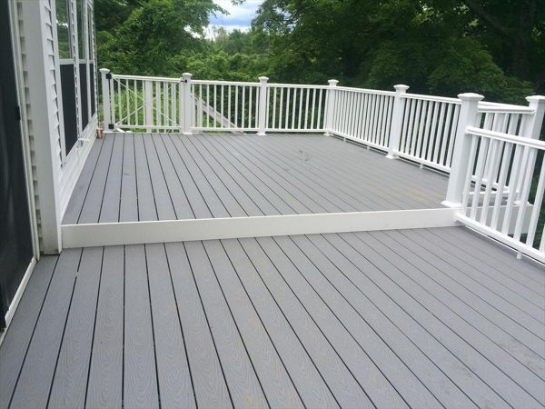 Select pebble grey decking, pvc trimboard risers and fascia, vinyl rails