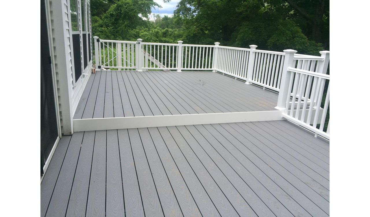 Select pebble grey decking, pvc trimboard risers and fascia, vinyl rails