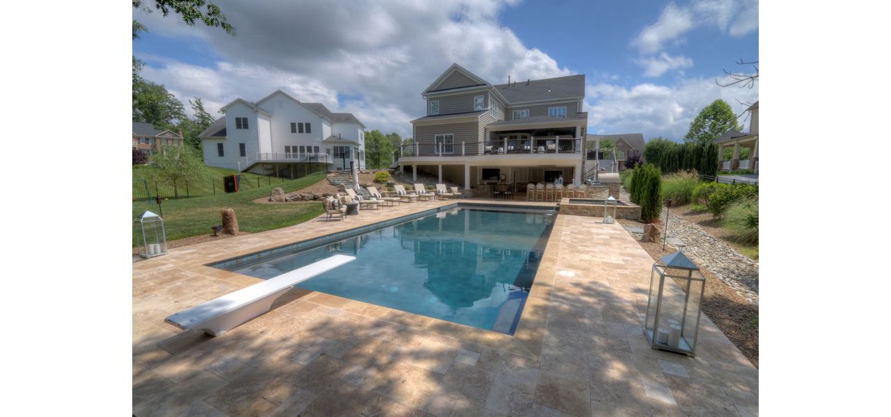 Trex Transcends Curved Deck, Open Porch, Fireplace, Rain Escapes, Travertine Patio, & Custom Pool